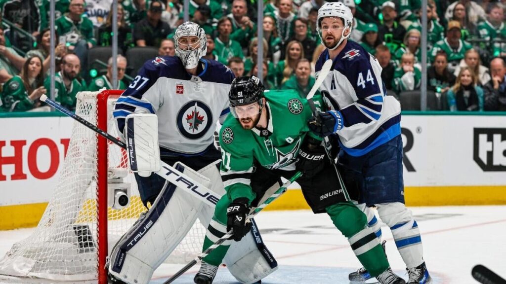 hellebuyck-seguin-morrissey-getty-cbs.jpg